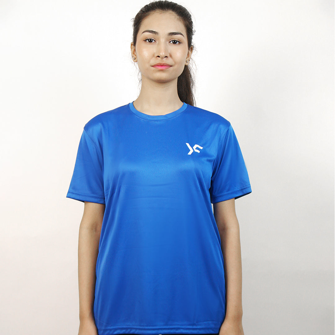 Person wearing a blue sports activewear shirt with a logo on a white background